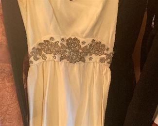 Amazing custom evening gown in ivory and beaded silver
1950s