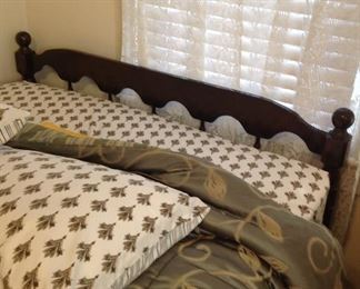 Full Size Bed with mattresses and bedding
