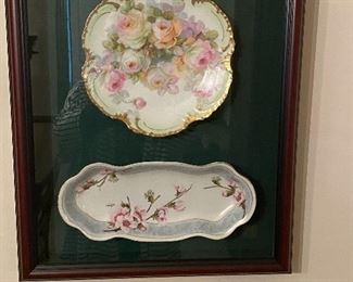 Another picture with bowls encased under glass