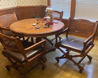 Kitchen/game table with set of 4 rolling chairs