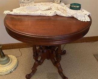 Table top shown without crochet cloth over it