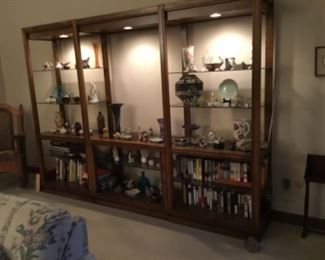 Lighted shelf with collectibles
