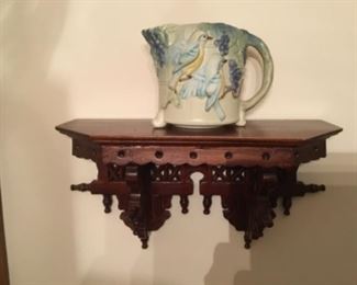 Shelf with pottery