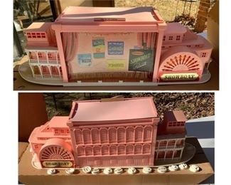 #5) $125 Vintage 1962 Pink Toy Theatre Showboat Playset by Remco.
Never Played with. Includes Showboat Scripts and Characters in original package as shown. Condition: Although unused the box has Storage Issues and the boat has some yellowing as shown.  4 Shows! Cinderella, Heidi, Wizard of Oz and Pinocchio. What a COOL TOY! (1 of 4 views) 