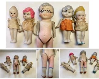 #63) $25 NOW 50% OFF (was $50 ) for group of 5 Vintage Bisque Dolls includes : Large 5” tall jointed Grandma Doll with painted glasses (she has wear on her back as shown) 2 cute girls with moveable arms and  Pink and Silver Hair(paint mark on her head) , 2 other jointed dolls. Smaller Dolls have original clothing and measure approx 3 “ tall. (1 of 2 views) 