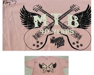 #139) $32 NOW 20% OFF (was $40 )Autographed Pink Marshal Tucker Band T shirt. MTB 40 years. Size L. Gildan Label. 1 signature .See spots on shirt as shown (1 of 2 views) 
