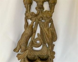 #23) $45 Antique brass match holder. Hunting motif of a rabbit, bird and hunting bag.  There is a rabbit hanging on one side and a pheasant on the other side. See aging 
In photos. Approx 11’’ x 5’’. (1 of 2 views) 