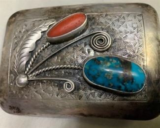 #131) $100 with belt NOW 20% (was $125)  Vintage Native American Signed FJ belt buckle.  Beautifully designed with coral and turquoise. Silver content. Not cleaned.  Approx 3 “ by 2 “. (1 of 2 views) 