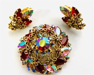#146) $32 NOW 20% OFF (was $40) Vintage Brooch and Earring set. Beautiful Lovely Flower Motif Clip Earring and Pin with Red/Purple AB Stones. Not cleaned. Unsigned. Good Vintage Condition. Measures approx 2” in diameter and I inch x 3/4 ‘’ wide clip ears.  (1 of 2 views) 