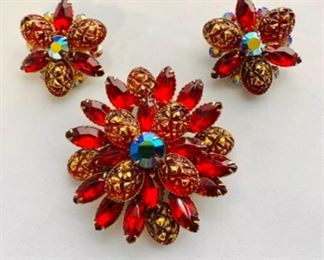 #148) $36 NOW 20% OFF (was $45 ) Vintage Signed Judy Lee Vibrant Red Glass Stones Brooch and Clip Earring set. Brooch measures 2 1/2 “ diameter and clips measure 1 1/2 “ in diameter. Not cleaned but in good vintage condition. (1 of 2 views) 