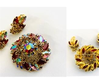 #146) $32 NOW 20% OFF (was $40 ) Vintage Brooch and Earring set. Beautiful Lovely Flower Motif Clip Earring and Pin with Red/Purple AB Stones. Not cleaned. Unsigned. Good Vintage Condition. Measures approx 2” in diameter and I inch x 3/4 ‘’ wide clip ears.  (1 of 2 views) 