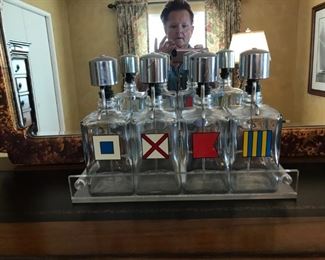 Mid Century Modern Lucite Base, with 4 Bottles.  Bar Set