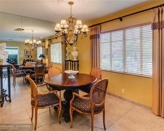 Set of 4 Chairs by Fairfield and Round Dining Room Table with 1 Leaf.  Two high pedestals, Bust art work