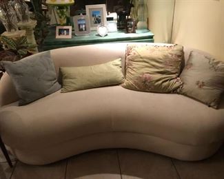 There is a pair of these sofas.