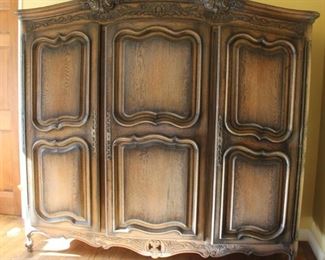 #12. $400.00. Armoire 74”h X 79”w X 24”d