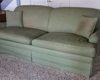 #21. $50.00. Green sofa no stains but worn 36”h X 79”w X 35”d