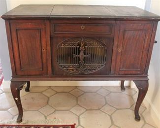 #27. $200.00. Brunswick phonograph cabinet needs work #8-146768. As is
