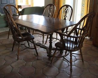 #30. $400.00. Thomasville Trestle table with 5 chairs T 30”h X 41”w X 67d / C 43”h X 20”w X 23”d . Some loss of veneer. See add'l views for a closeup.