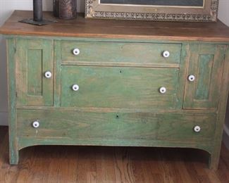 #39. $150.00. Painted green cabinet with oak top 30”h X 48”w X 21.5”d