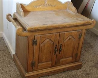#63. $125.00. Small side table With side towel bars...finish issues to top 32”h X 34”w X 17”d