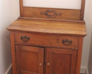 #65. $175.00. Oak washstand With towel bar. 45”h X 32”w X 16”d
