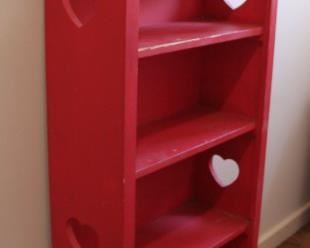 #66 $75.00. Red bookshelf 45”h X 24”w X 12”d