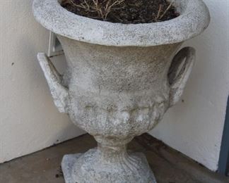 #85. $150.00. Concrete urn 23”h X 19” diameter