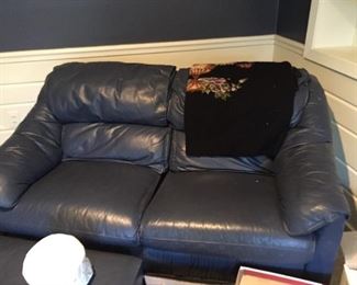 Blue leather loveseat with ottoman (great condition).