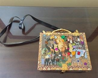 Over 50 purses - in many unusual patterns and styles.