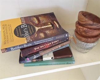Small selection of books and wooden bowls.