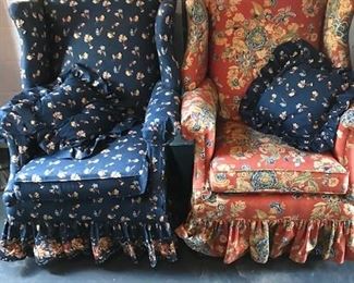 Floral upholstered armchairs.