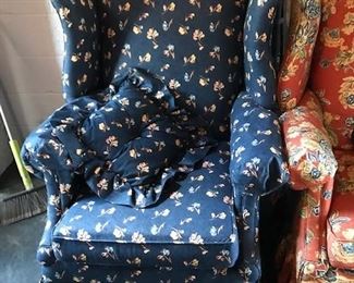 Floral upholstered armchairs.