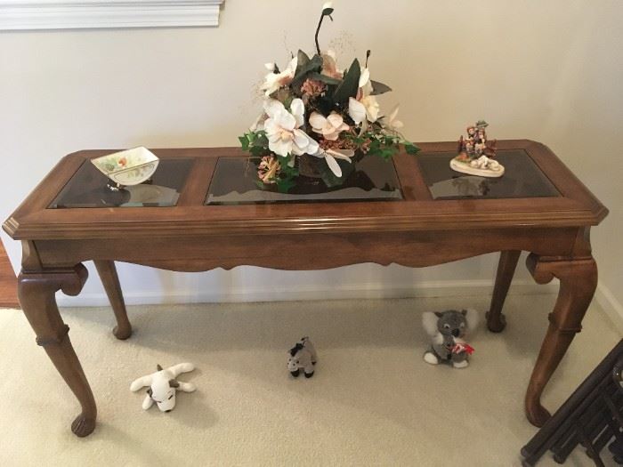 . . . a very nice sofa/wall table with Hummel accent