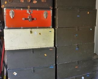 Assortment of military trunks