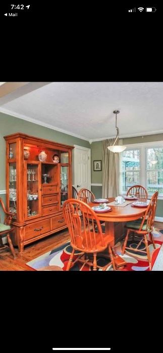 Oak dining table with six chairs $375