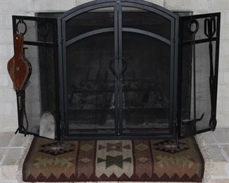 panacea Black Metal 3 Panel Classic Arched Top Fireplace Screen (32”H x 53”W) with 4 piec set of tools: Coal Shovel, Hearth Brush, Poker and Tongs. Shown with Southwest Flat Weave Throw Rug(2’ x 4’)