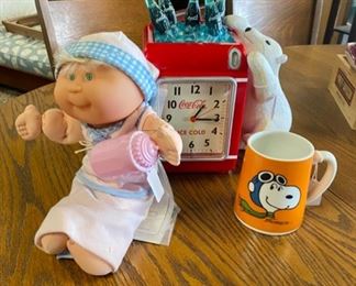 c.1971 Snoopy / Schulz "Fly Me To The Moon" Music Mug, Vintage Cabbage Patch Baby, and Coca-Cola Polar Bear Clock / Coin Bank.