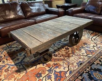 WHAT A GREAT PIECE FOR A COFFEE TABLE, RIGHT?!!! This is an Vintage Wooden Railway Cargo Cart with Original Metal Wheels!