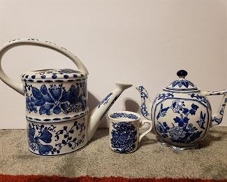 https://ctbids.com/#!/description/share/681940 Beautiful blue and white teapot, teacup, and watering can.


