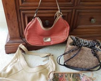 https://ctbids.com/#!/description/share/682020 Rust colored Nine West, beige Etienne Aigner, straw Croft and Barrowe and giraffe design Saddle River purses.

