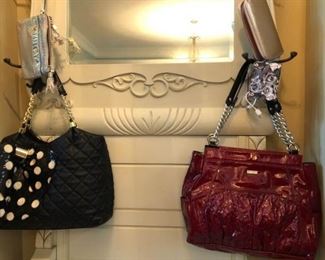 https://ctbids.com/#!/description/share/682355 Miche and Betsey Johnson purses (both like new), Juicy wristlet (good used condition), Adrienne Vittadini wristlet with charging station attached (excellent condition).

