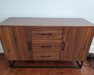 https://ctbids.com/#!/description/share/685482 Wood veneer console with metal frame base. 2 cabinets and 3 drawers. 47x16x30" Cabinets 15x14x20" 10" between shelves Drawers 14x11x3.5"