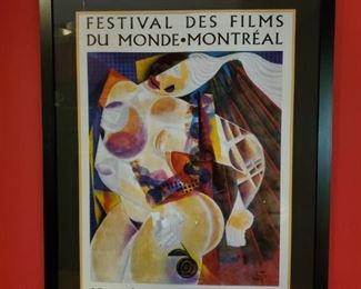 https://ctbids.com/#!/description/share/687666 Framed print of Festival Des Films Du Monde Montreal September 1998 by Almada Ramos matted with black frame. 32”L 42"H

