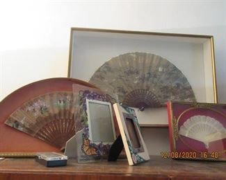 several framed fans