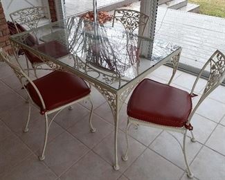 Woodard "oak" wrought iron table and chairs (never outside)