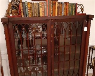 lawyers book case, vintage books, clock, crystal cruets