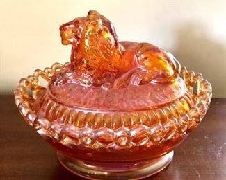 $30 Lion lid amber color dish with cover.  8"L; 6"W; 6"L 