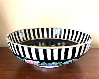 $30 Signed Floral bowl.  3.5"L; 10" diam 