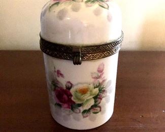 $35 Floral hinged porcelain box.  4" H; 2.5" diam