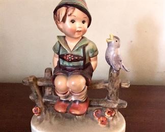 $25 Hummel boy with a singing bird.  4" L; 2.5"W; 5" H 